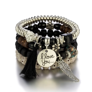 Bohemian multilayer beaded bracelet set with black tassels and angel wing pendant charm