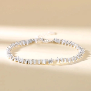 Detail of S999 sterling silver bracelet featuring matte texture and adjustable lobster clasp