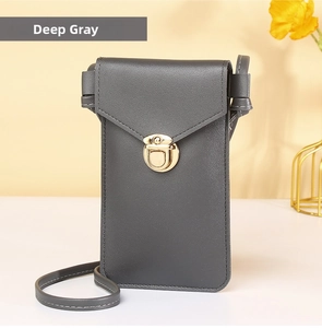 Detail of dark gray PU leather crossbody phone bag with gold twist lock and envelope flap