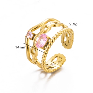 Detailed macro view of gold multi-layer chain ring with pink stones, 2.9g and 14mm size