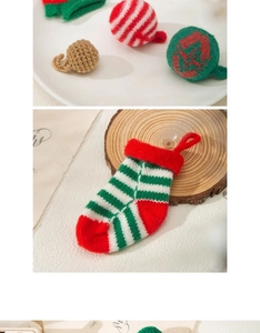 Detailed view of hand-knitted Christmas ornaments featuring festive patterns and soft textures