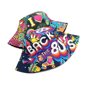 Reversible 80s retro bucket hat with colorful tape and graffiti prints on canvas fabric