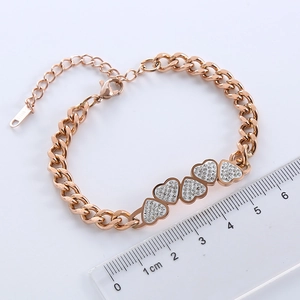 Rose gold stainless steel heart bracelet with paved zircons and lobster clasp closure
