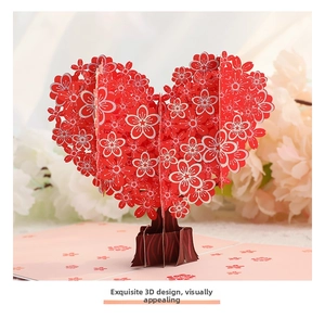 Detail of 3D pop-up greeting card featuring a red heart-shaped cherry blossom tree design