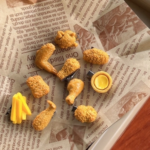 Set of 8 creative 3D simulated fried chicken and french fries hair clips on newspaper