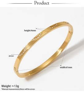 Detail view of gold-plated stainless steel bangle with zircon and size specifications