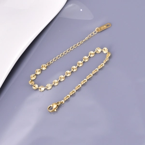 18K gold plated titanium steel bracelet with sunburst texture charms and lobster clasp