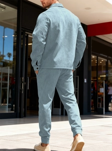 Rear view of light blue men's casual suede tracksuit set with jacket and jogger pants
