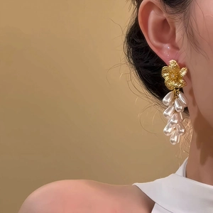 Elegant gold flower drop earrings with white waterdrop pearls in vintage French style