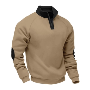 Detail of khaki pullover sweatshirt with contrast black elbow patches and stand collar zipper