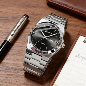 Elegant men's watch with steel band and black dial showing day and date features