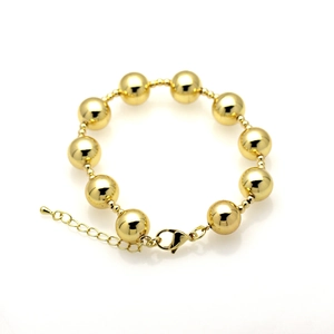 Minimalist 18k gold plated ball bead bracelet with lobster clasp on a white background
