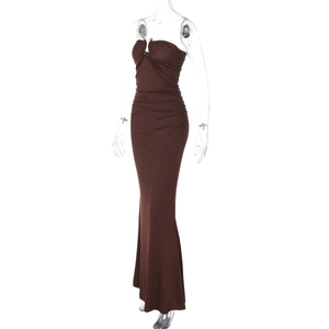 Detail view of the brown ruched fabric and slim-fit side seam on the strapless maxi dress