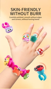 Detail of skin-friendly silicone cartoon rings and bracelets for kids on hand