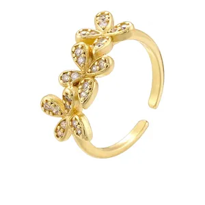Luxury gold adjustable brass ring featuring three butterflies with sparkling zircon stones