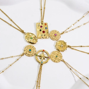 Collection of gold 14K stainless steel necklaces with colorful gemstone pendants