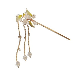 Épingle à cheveux muguet élégante avec fleurs blanches, feuilles vertes et glands dorés