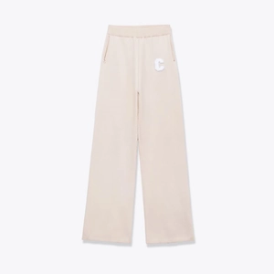 Detail of beige knit wide-leg pants with C-letter embroidery and elastic waistband