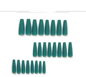Detailed set of matte dark green long coffin press-on nails with frosted finish texture