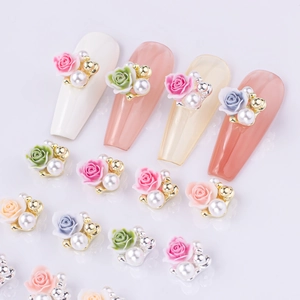 3D resin rose nail art charms with pearls and gold beads in pastel pink and green