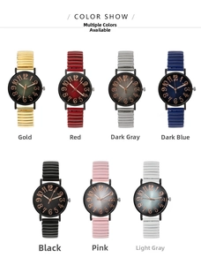 Detail shot of multi-color quartz watches with flexible metal expansion bands and gradient dials