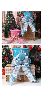 Pink and blue Christmas tree topper hats with snowflake sequins and ribbon bows