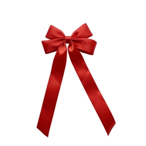 Close-up of a vibrant red satin ribbon hair clip with double bow and long elegant tails