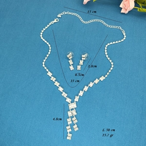 Silver rhinestone jewelry set measurements showing necklace length and earring dimensions