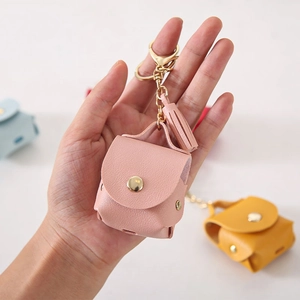 Pink PU leather earphone case with gold keychain and tassel for AirPods 1/2
