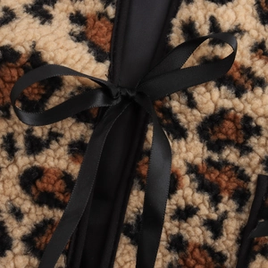 Loose leopard print fleece jacket for women with black satin ribbon tie closure detail