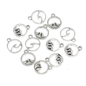Ensemble de pendentifs ronds en argent antique avec motifs de montagne et vague