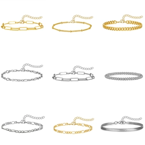 Detailed grid of gold and silver layered bracelets with adjustable lobster clasps