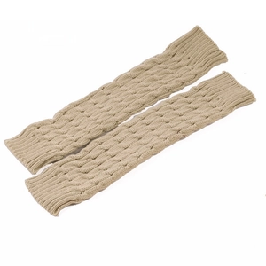 Detailed view of dark beige cable knit leg warmers with ribbed elastic cuffs texture