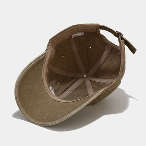 Interior detail showing 100% cotton stitching and metal eyelets on vintage baseball cap