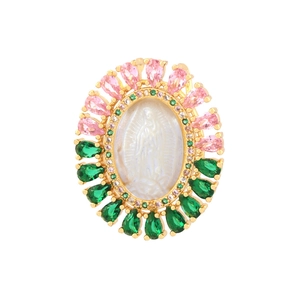 Detailed view of gold pendant with multicolored zircon inlay and shell cameo Virgin Mary