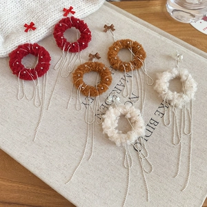 Plush round earrings with ribbon bows and silver metallic tassels in three colors