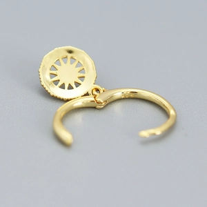 Elegant 925 sterling silver compass star dangle earrings in a golden finish for women