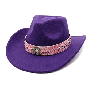 Detail of purple wool cowboy hat with pink woven band and vintage silver metal buckle