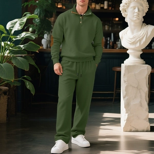 Set in maglia a coste verde scuro da uomo con polo con toppe sui gomiti e pantaloni