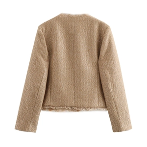 Detail view of the fringe hem and textured tweed fabric on the back of a brown jacket