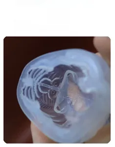 Macro detail of flexible tiger silicone mold showing intricate facial texture for DIY crafts