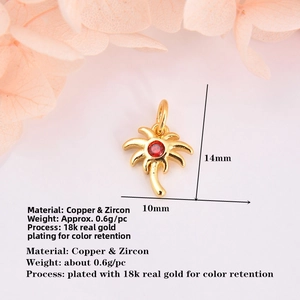 Macro detail of gold-plated palm tree pendant with red zircon and 14mm size specs