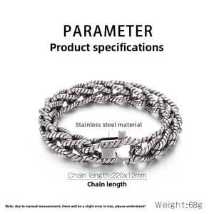Detail view of punk retro twisted chain bracelet in stainless steel with specs