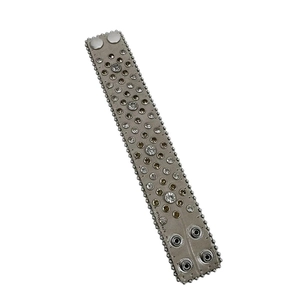 Wide leather bracelet with sparkling rhinestones and silver studs in punk style