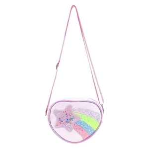 Detail of pink heart-shaped girls bag with glitter star and rainbow sequin design