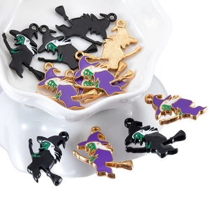 Detail of colorful enamel witch on broom pendants for Halloween DIY jewelry making