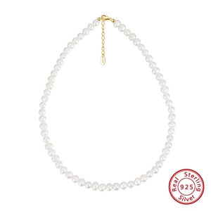Macro detail of natural freshwater pearl necklace with S925 sterling silver clasp and chain