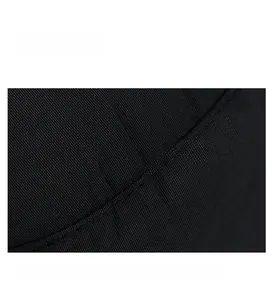Detail of neatly stitched arc seam on black quick-dry fabric with high-density twill texture