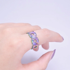 Rainbow gradient woven cross ring in titanium steel with adjustable open band for unisex