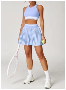 Women's pleated tennis skirt set with racerback bra and contrast stripes for fitness